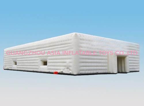 large white inflatable party event marquee tent with window and tunnel entrance